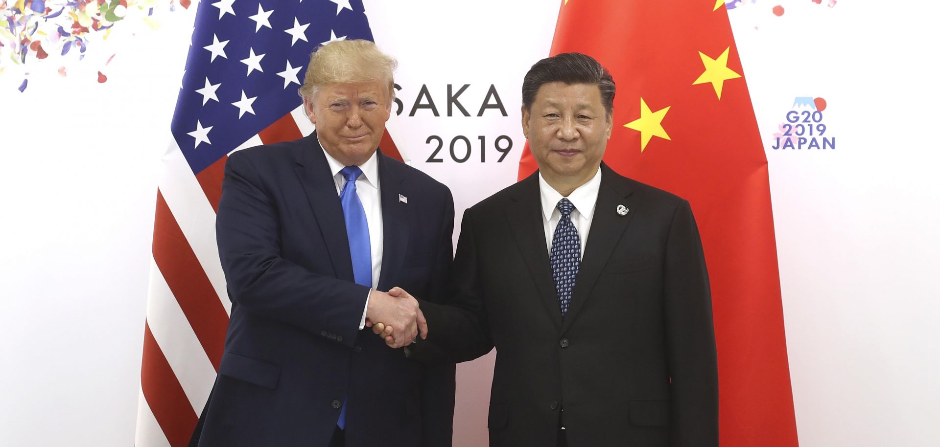 Chinese President Xi Jinping shakes hands with U.S. President Donald Trump before a bilateral meeting during the G-20 Summit on June 29, 2019, in Osaka, Japan.