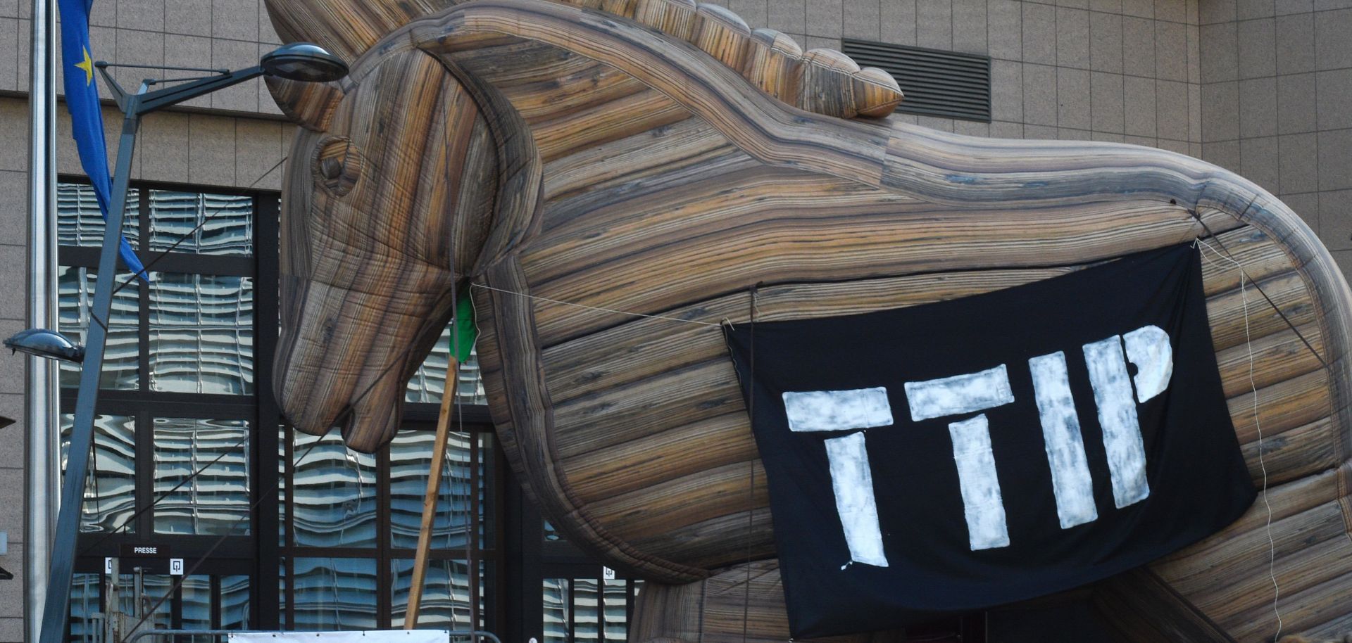 Protesters use an inflatable Trojan horse outside European Union headquarters on Sept. 20, 2016, to express their disagreement with the planned Transatlantic Trade and Investment Partnership.