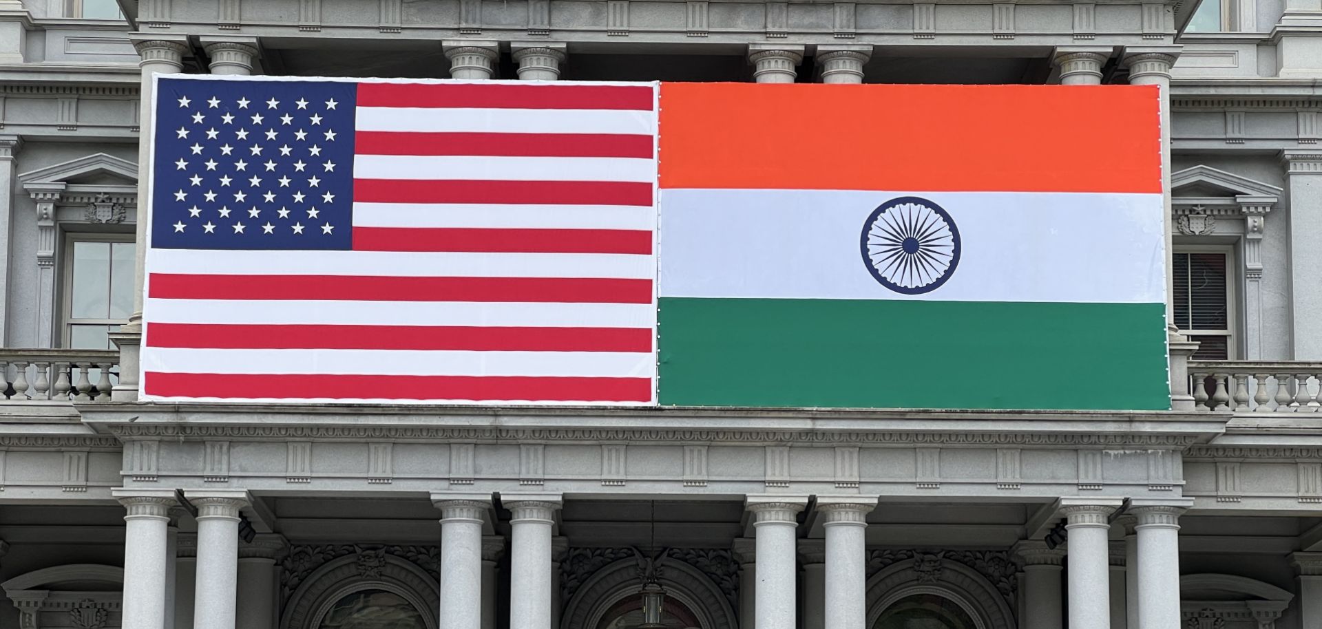 The U.S. and Indian flags adorn the Eisenhower Executive Office Building of the White House in Washington, D.C., on June 20, 2023.