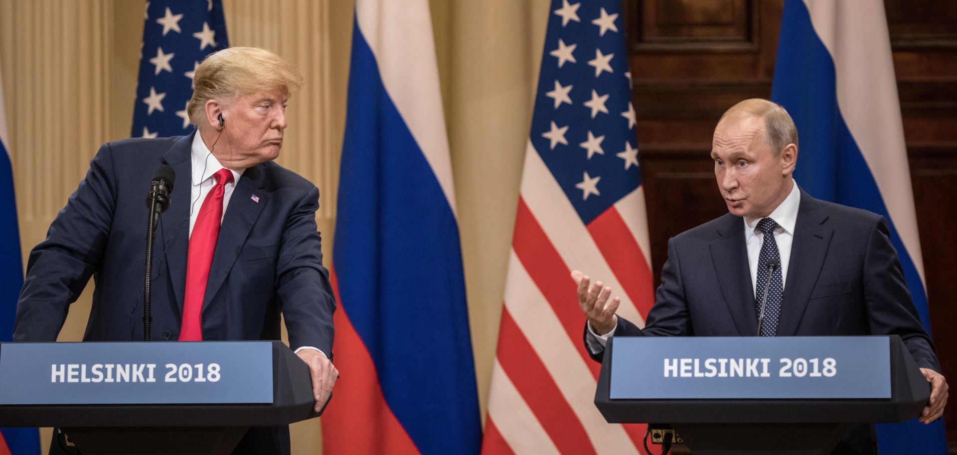 U.S. President Donald Trump and Russian President Vladimir Putin answer questions after their summit meeting on July 16, 2018, in Helsinki, Finland.