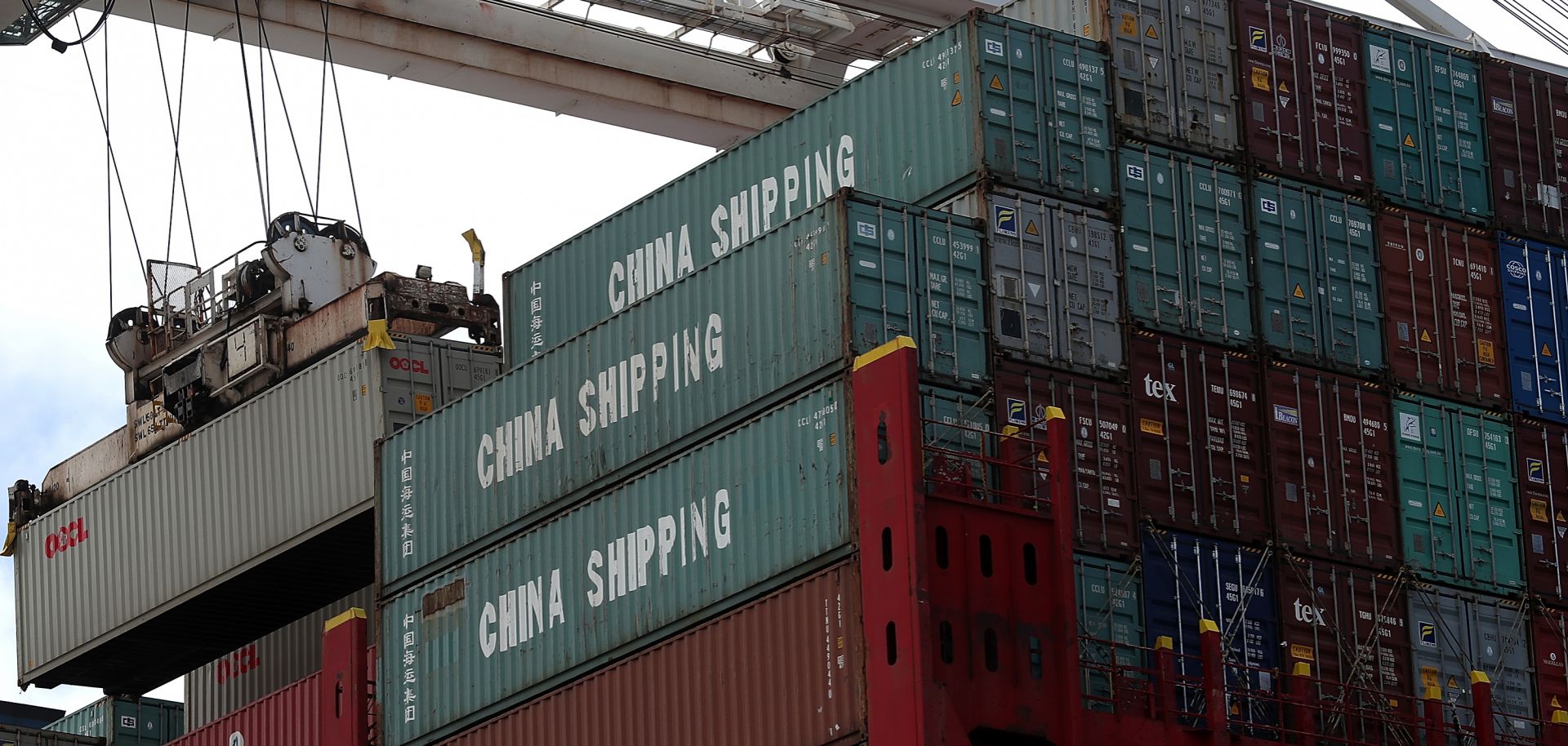 A shipping container is offloaded from a Chinese container ship at the Port of Oakland on June 20.
