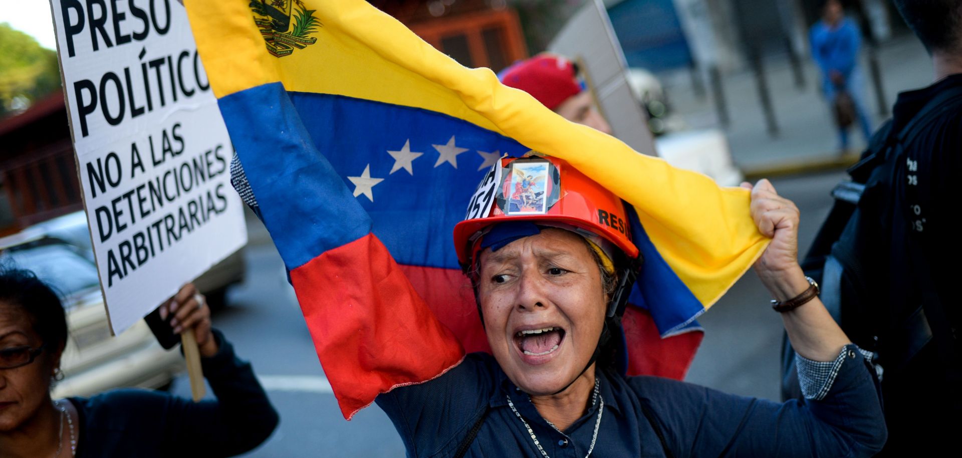 An anti-government protestor in Venezuela demonstrates in memory of jailed protestors and those harmed by protests. 