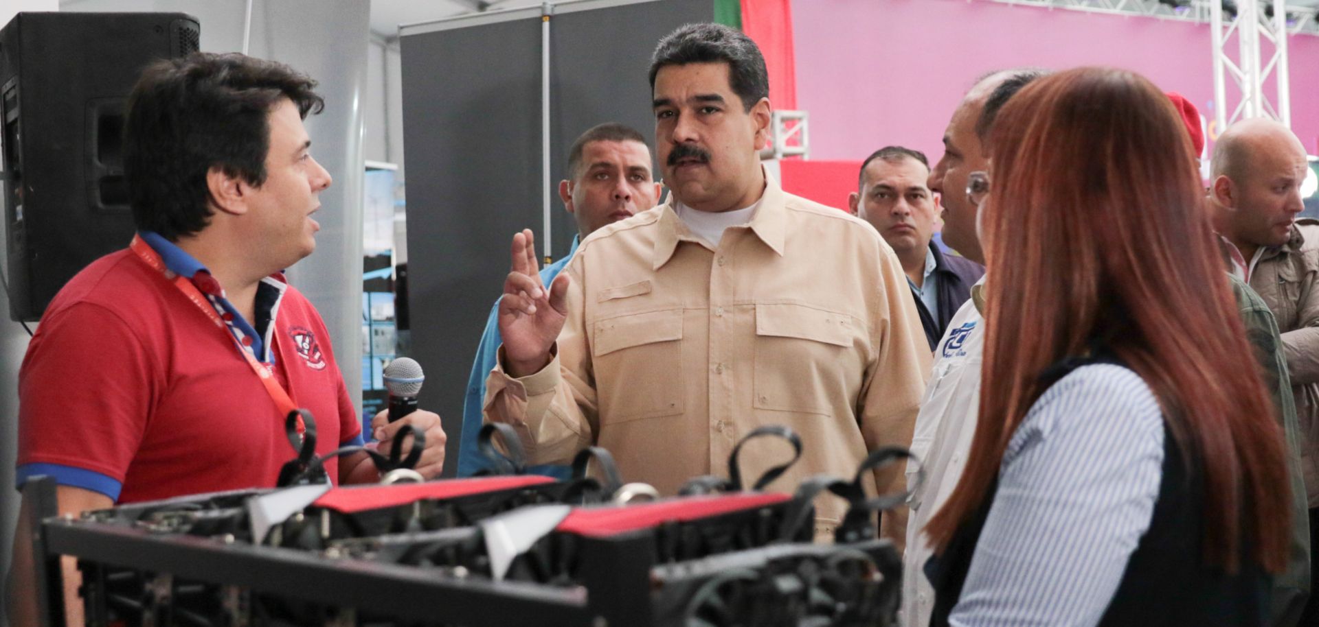 President Nicolas Maduro (C) of Venezuela attends the International Science and Technology Fair in Caracas on Dec. 3.