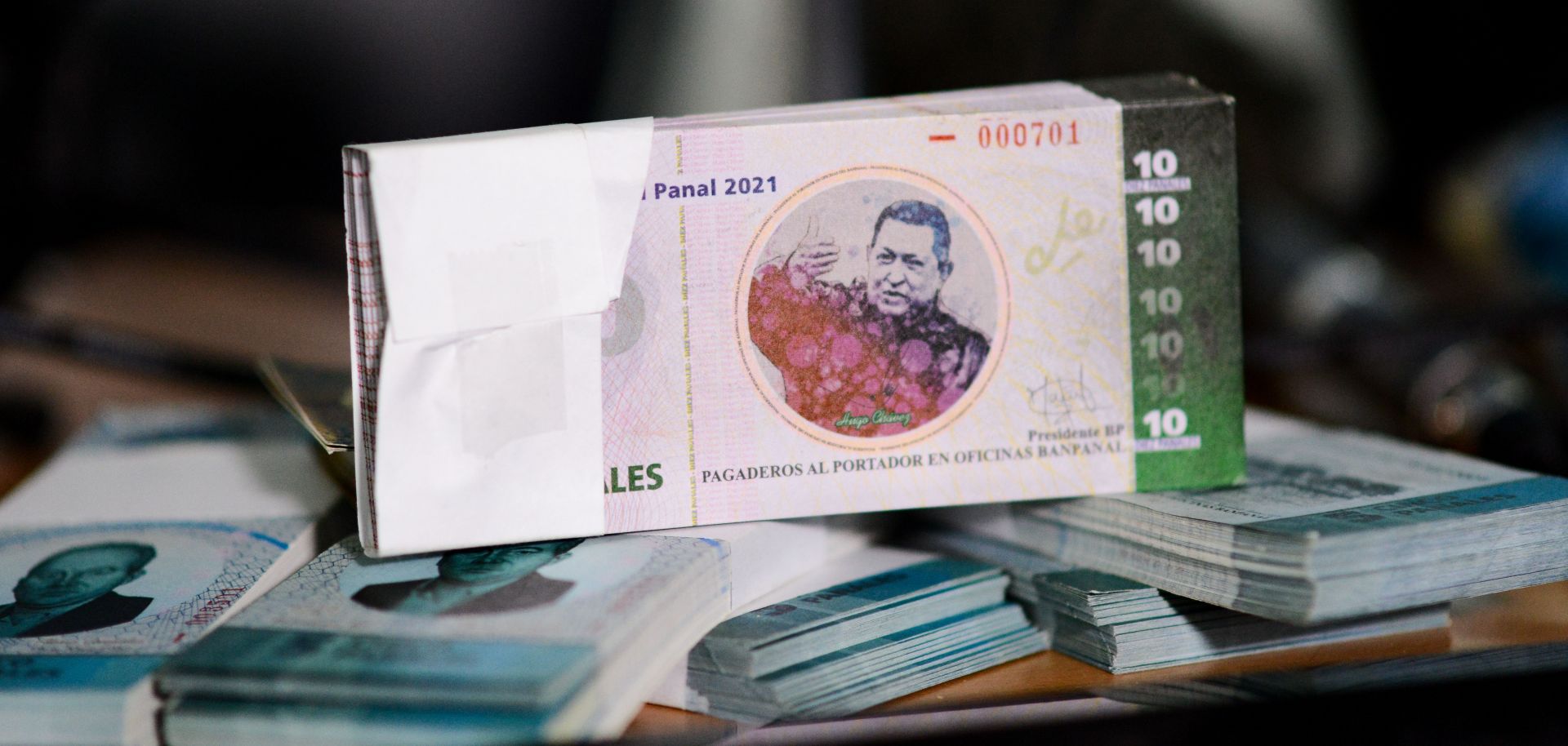 A collective in a hilltop shantytown in Caracas created its own currency, the panal, to fight chronic shortages of cash in inflation-ridden Venezuela.