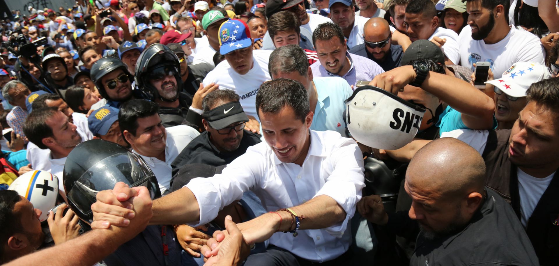 Juan Guaido, leader of the political opposition movement in Venezuela, greets supporters at a demonstration on May 1, 2019.