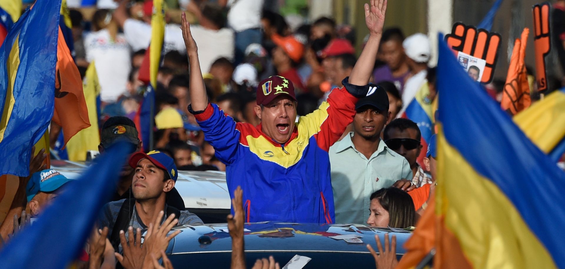 Henri Falcon, an opposition candidate in Venezuela's presidential elections, waves during the closing rally of his campaign ahead of the May 20 presidential election, which is largely expected to result in a win for the incumbent, President Nicolas Maduro.