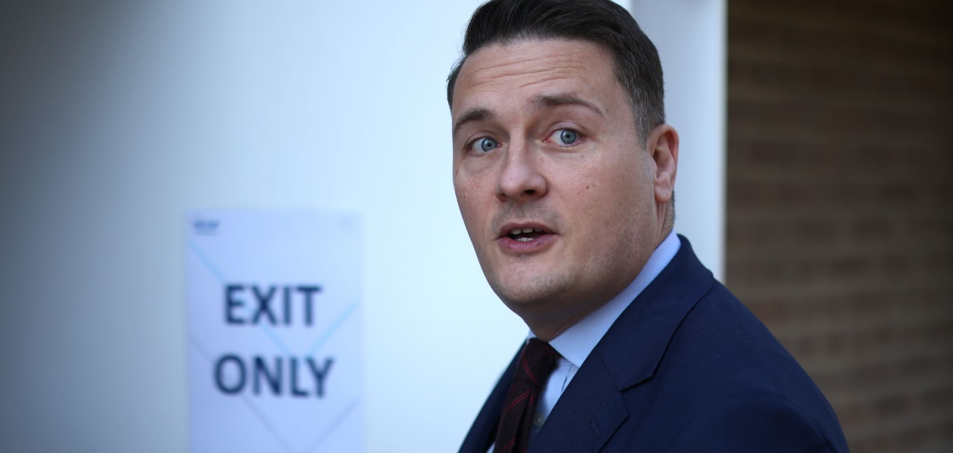 U.K. Health Secretary Wes Streeting arrives at the University of Kent in Canterbury, England, on March 19, 2026, as students receive the Meningitis B vaccine.