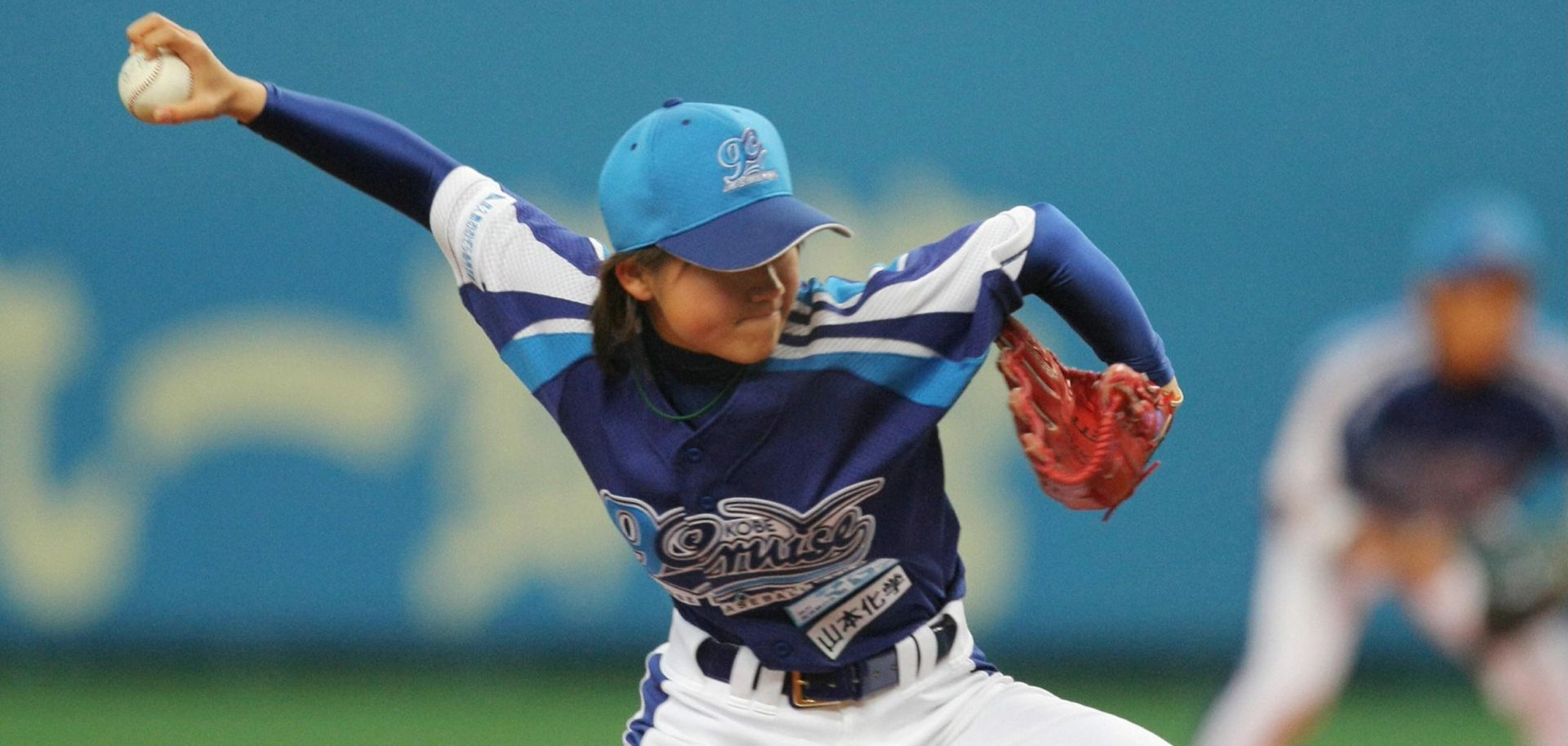 Seventeen-year-old schoolgirl Eri Yoshida became the first woman to play professional baseball with men in Japan when she took the mound at the weekend in a new independent league. 