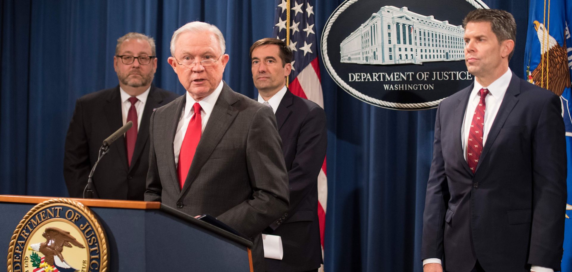 Former U.S. Attorney General Jeff Sessions announces the creation of a new initiative to crack down on Chinese intelligence officials stealing intellectual property from U.S. corporations through hacking and espionage during a press conference at the Justice Department on Nov. 1, 2018.