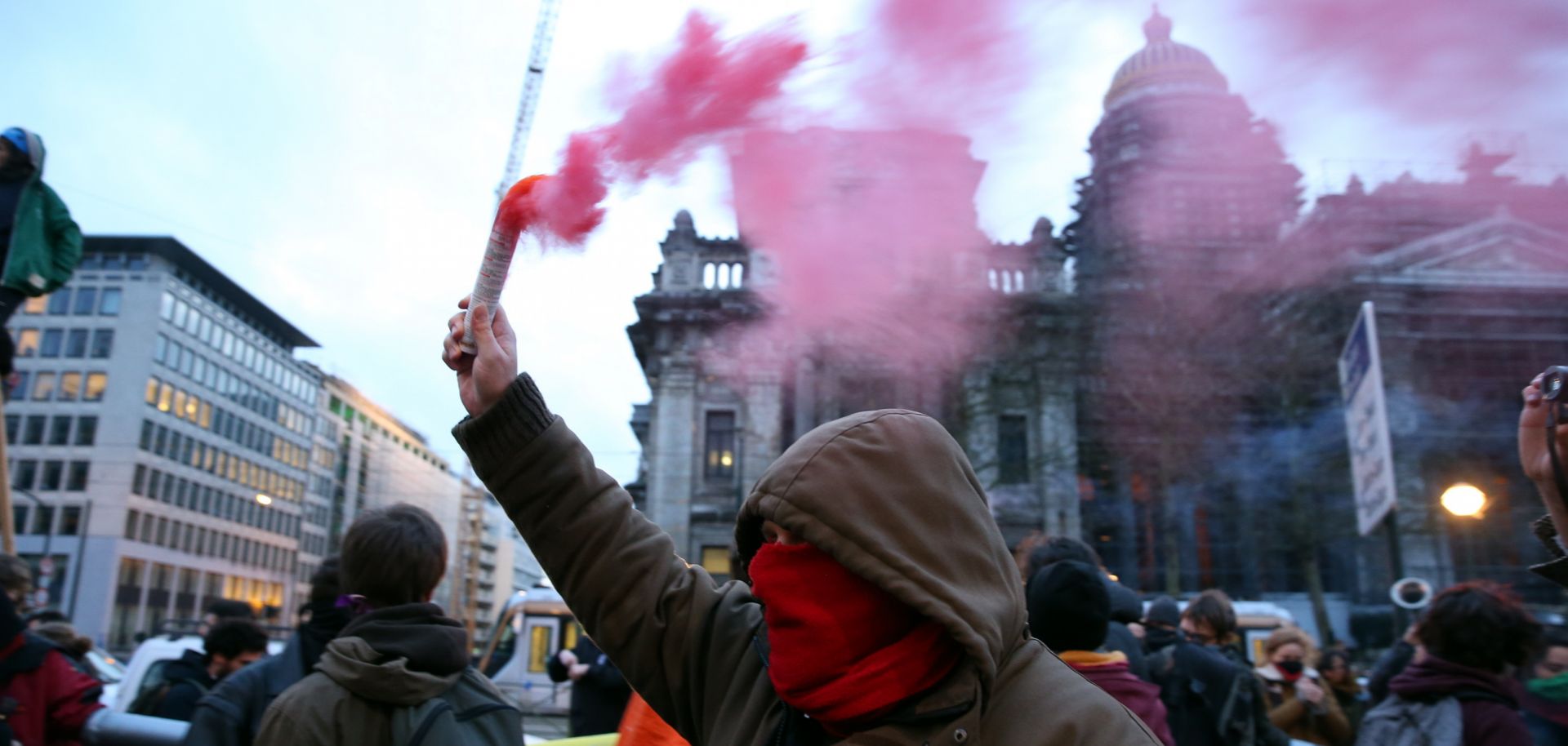 Environmentalists stage a protest against a World Economic Forum briefing meeting in Brussels on Jan. 27, 2020.