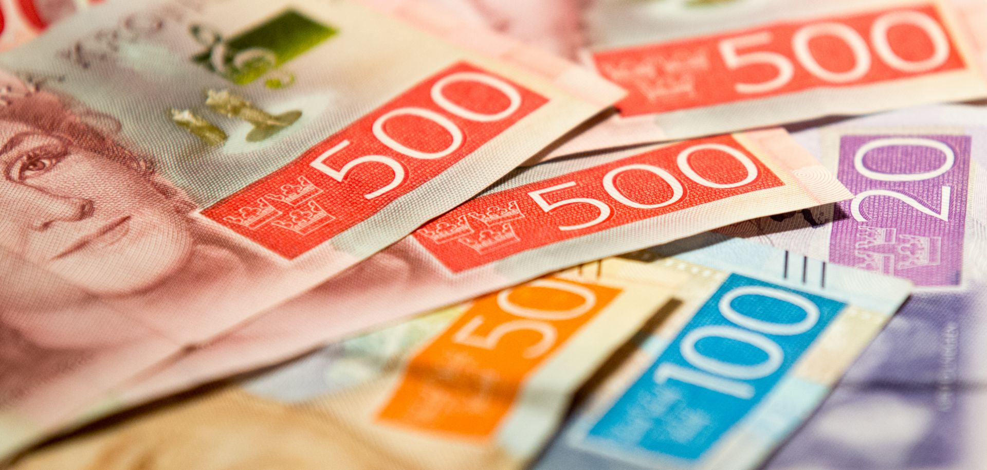 This photo illustration displays Swedish krona banknotes.