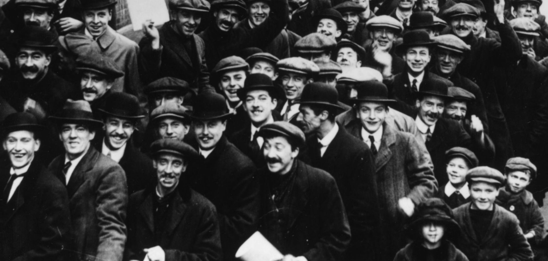 Men line up at an army recruiting office in London in December 1915.