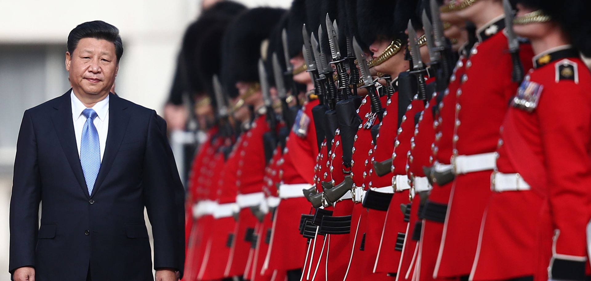 Chinese President Xi Jinping reviews an honor guard on Oct. 20, 2015, in London.