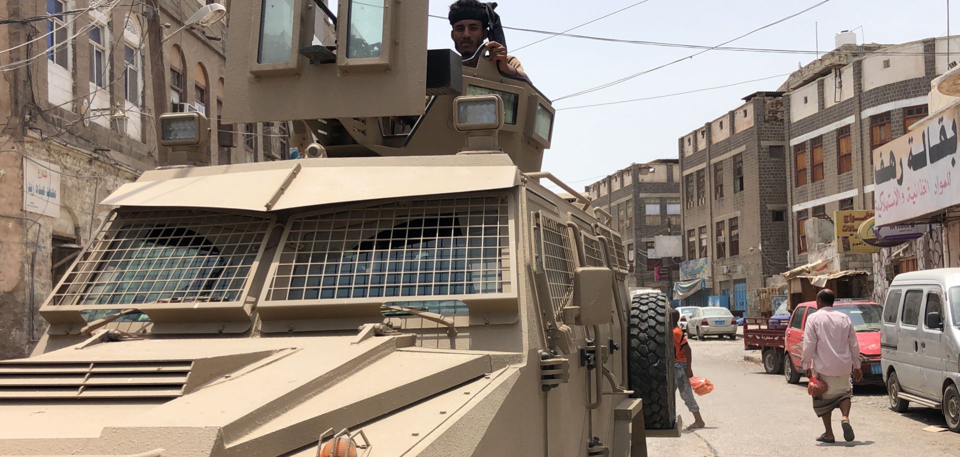 A member of the southern separatist movement rides an armored military vehicle in Aden, Yemen, on Aug. 11, 2019.