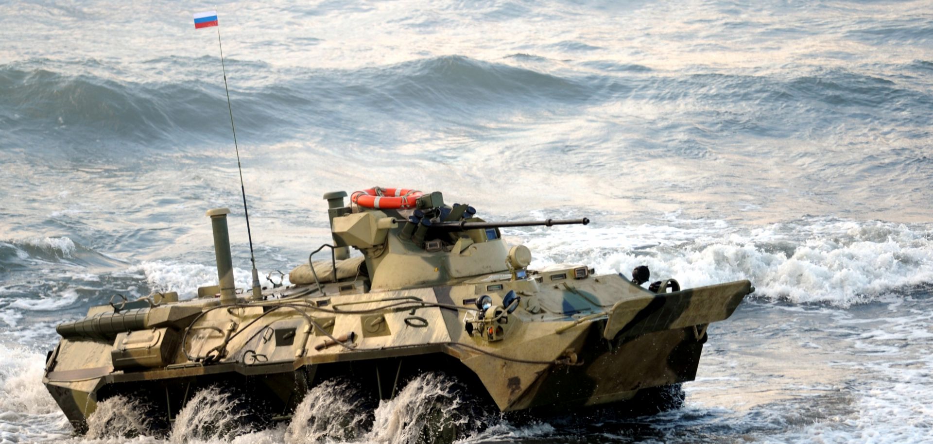 A Russian-built BTR-82A amphibious armored personnel carrier lands on the shore during 2013 joint military exercises with Belarus in the Russia's Kaliningrad enclave.
