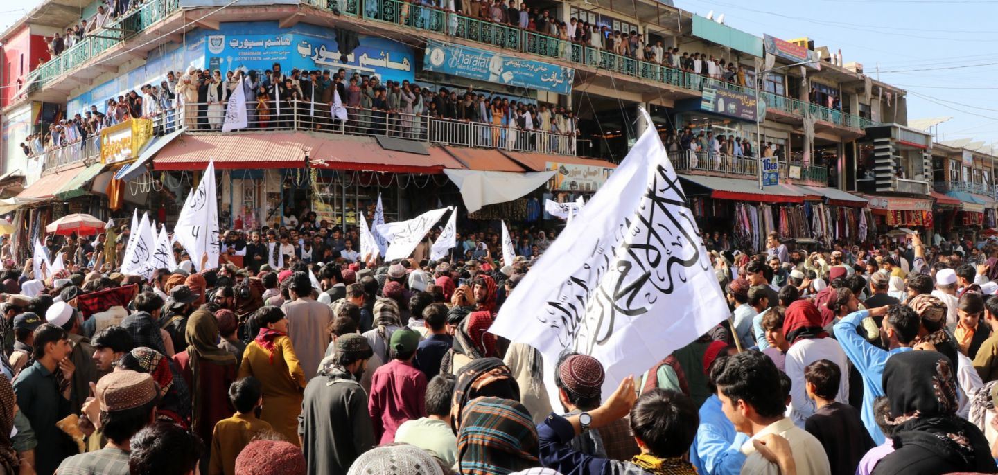 Afghan men gather in support of the Taliban government during a rally in Khost, Afghanistan, on Oct. 13, 2025, amid heavy cross-border clashes with Pakistan.