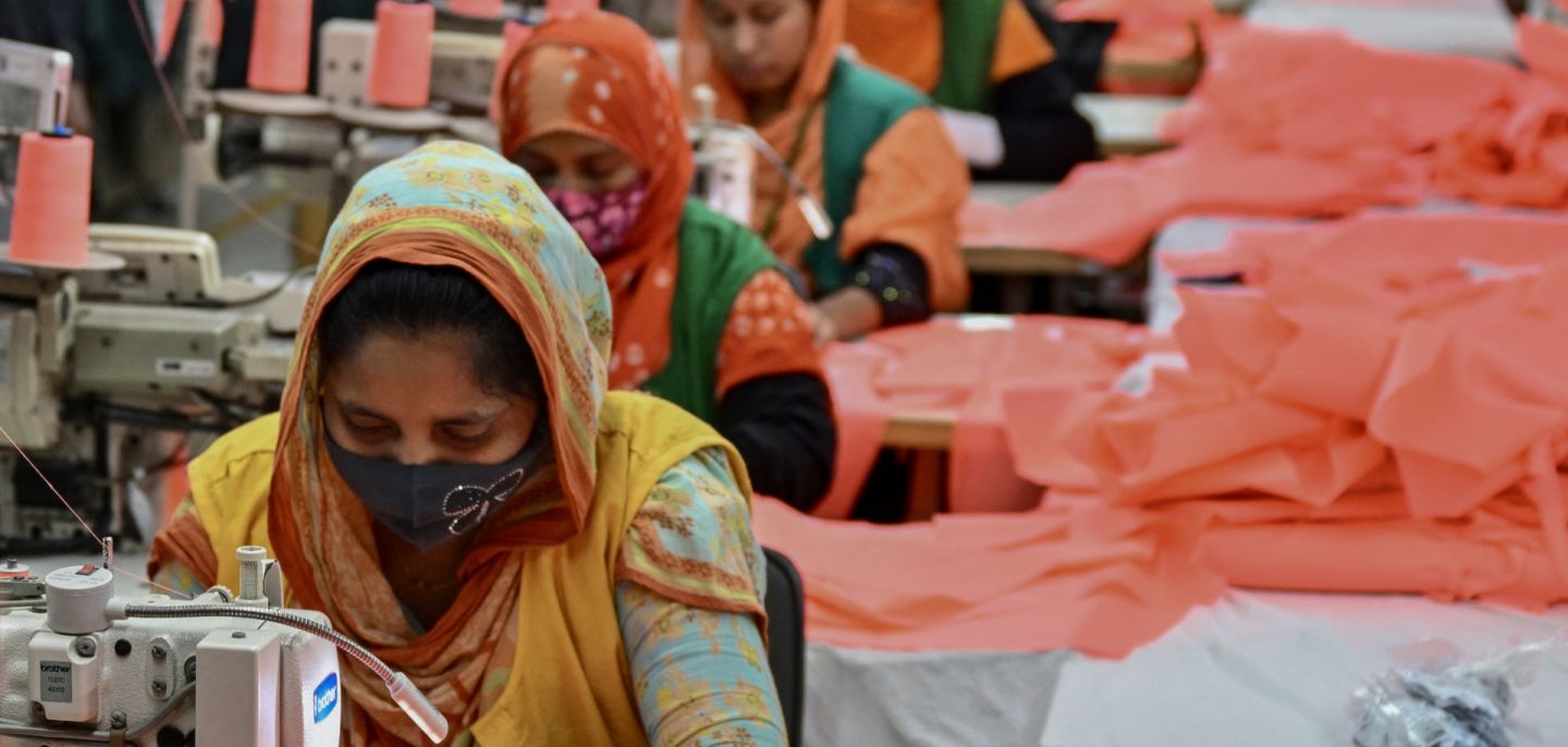 Garment workers sew clothes at a textile factory in Dhaka, Bangladesh, on Dec. 29, 2024. 