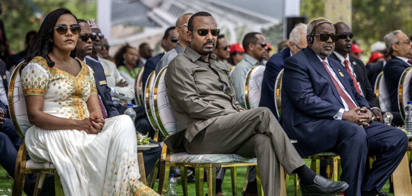 Ethiopian Prime Minister Abiy Ahmed (center), flanked by his wife (left) and Djibouti's President Ismail Omar Guelleh (right), attends the official inauguration ceremony of the Grand Ethiopian Renaissance Dam (GERD) in Guba, on Sept. 9, 2025. Ethiopian Prime Minister Abiy Ahmed (center), flanked by his wife (left) and Djibouti's President Ismail Omar Guelleh (right), attends the official inauguration ceremony of the Grand Ethiopian Renaissance Dam (GERD) in Guba, on Sept. 9, 2025.