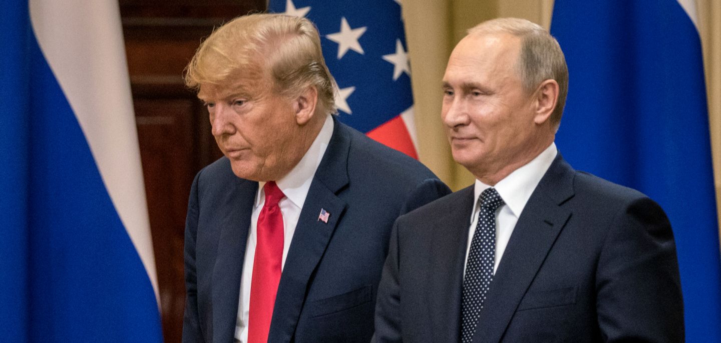 U.S. President Donald Trump (left) and Russian President Vladimir Putin arrive at a press conference after their summit on July 16, 2018, in Helsinki, Finland.