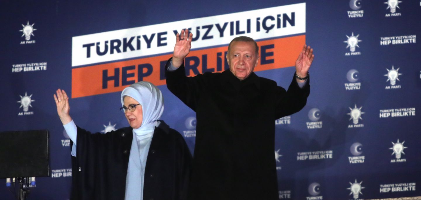 Turkish President Recep Tayyip Erdogan waves to his supporters from a balcony in Ankara, Turkey, on May 15, 2023. 