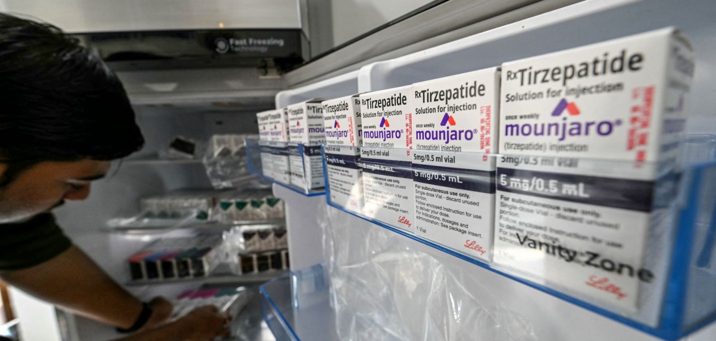 A medicine distributor stores Mounjaro (tirzepatide) self-injecting GLP-1 prefilled pens and vials in a fridge at his office in Thane, India, on March 20, 2026. A medicine distributor stores Mounjaro (tirzepatide) self-injecting GLP-1 prefilled pens and vials in a fridge at his office in Thane, India, on March 20, 2026.