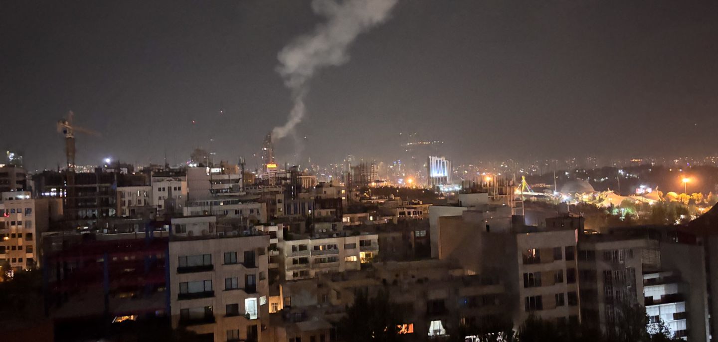 Smoke rises from a location allegedly targeted in Israel's wave of strikes June 13, 2025, in Tehran, Iran.