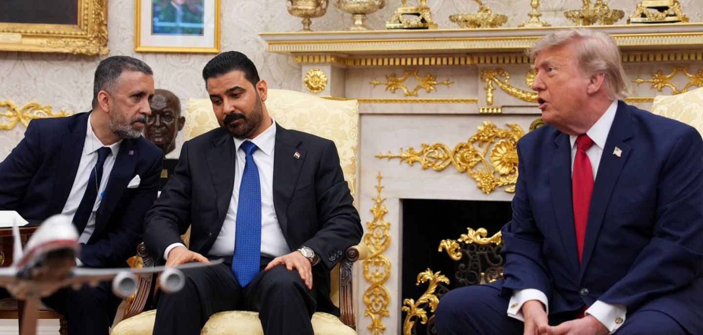 U.S. President Donald Trump (right) speaks during a meeting with Iraqi Prime Minister Ali al-Zaidi (2nd-L) in the Oval Office of the White House on July 14, 2026.