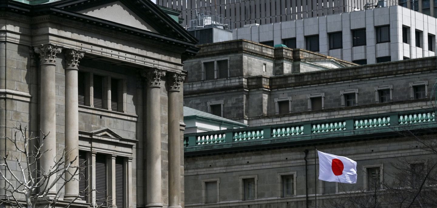 The Japanese flag flies outside the Bank of Japan (BoJ) headquarters in central Tokyo on March 19, 2024. The Japanese flag flies outside the Bank of Japan (BoJ) headquarters in central Tokyo on March 19, 2024.
