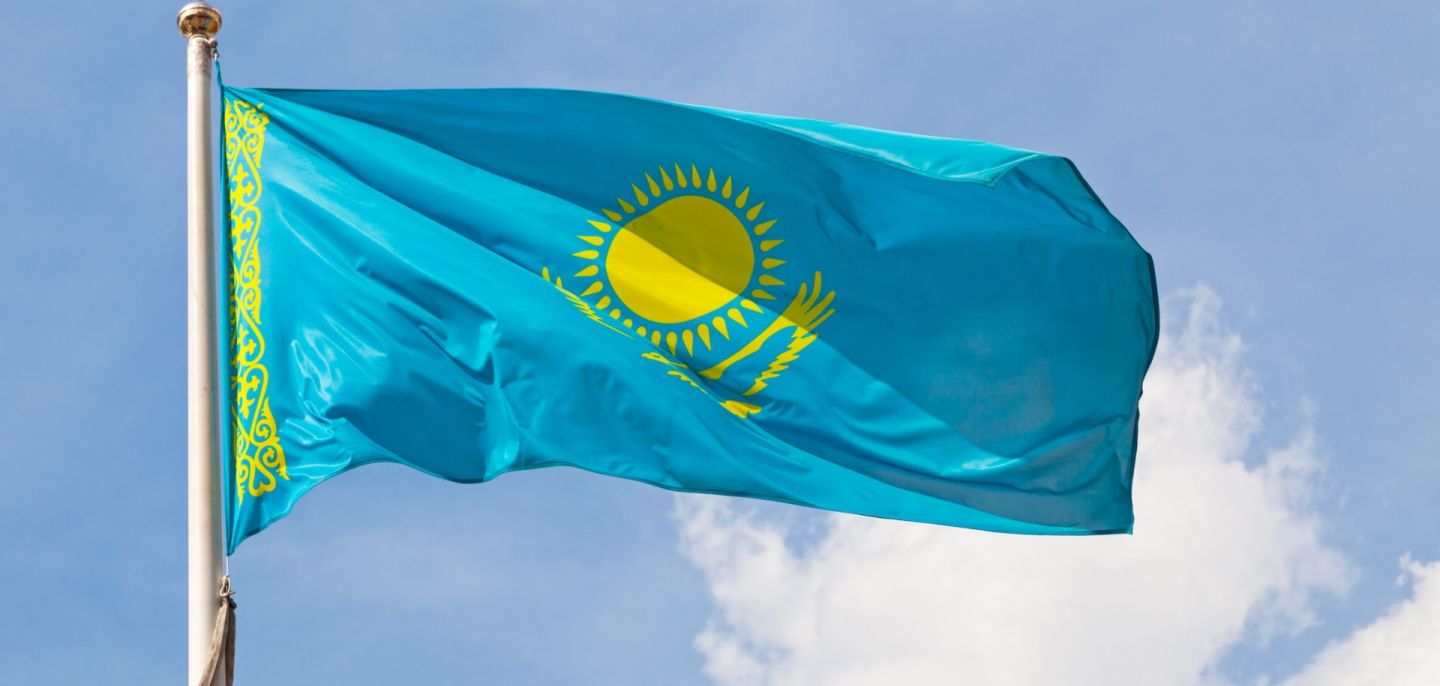 The national flag of Kazakhstan waves in the wind. The national flag of Kazakhstan waves in the wind.