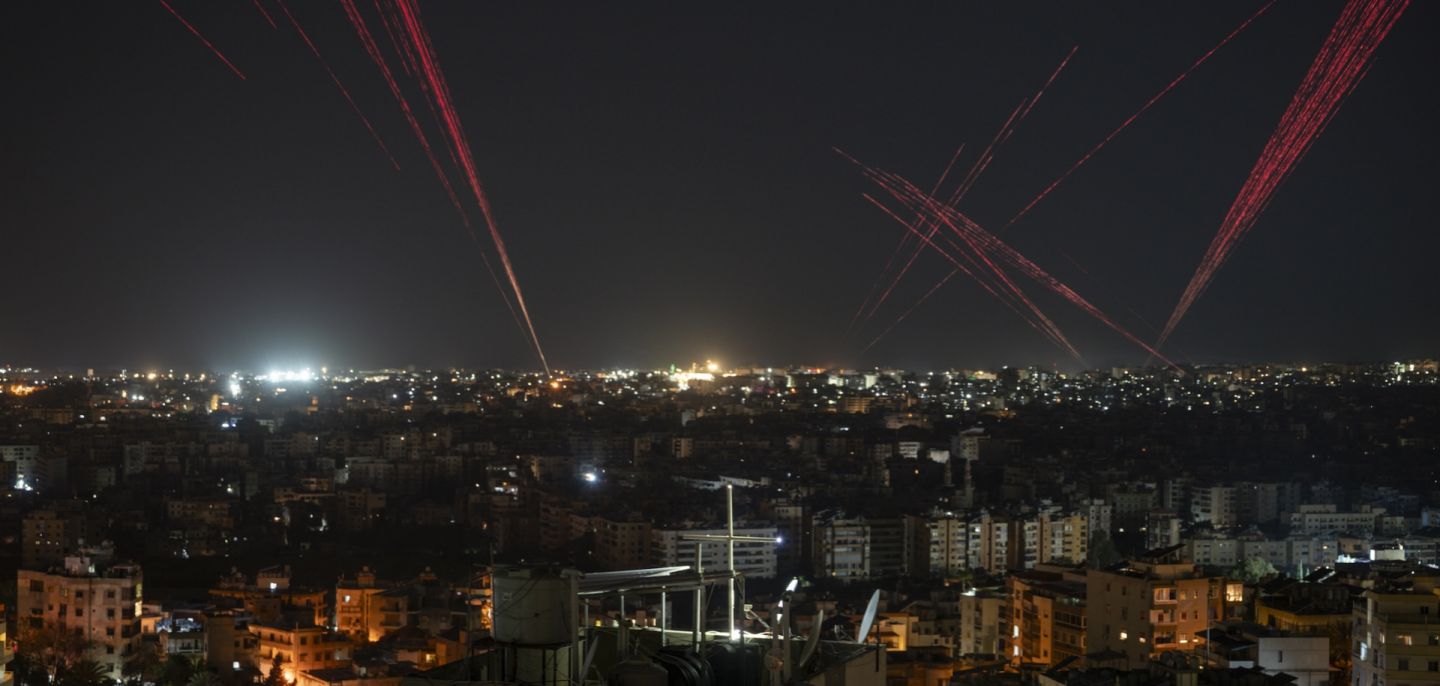 People in Beirut fire bullets into the sky to celebrate the new Lebanon-Israel ceasefire agreement on April 16, 2026. 