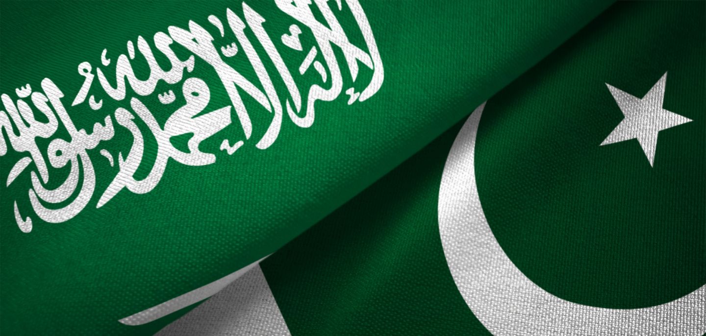 A digital illustration of Pakistan and Saudi Arabia’s national flags.