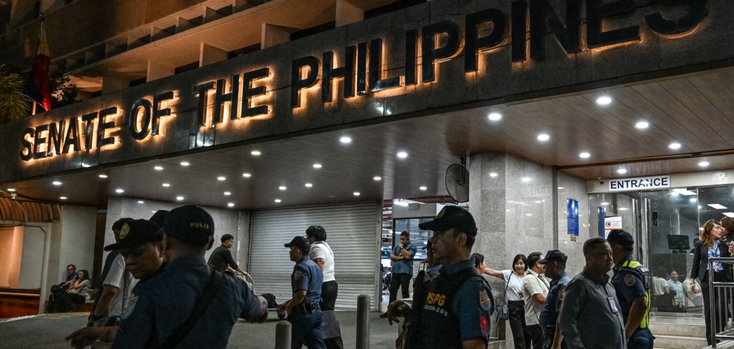 Police personnel arrive outside the Senate of the Philippines in Pasay, Metro Manila, on May 13, 2026.