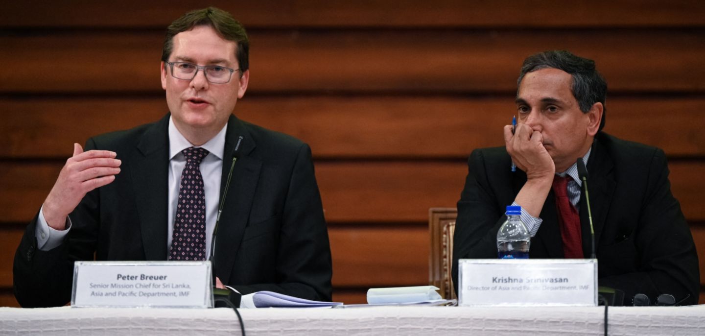 (From left to right) Peter Breuer, International Monetary Fund (IMF) Mission Chief for Sri Lanka, speaks next to Krishna Srinivasan, the Director of the IMF's Asia and Pacific Department, during a press conference in Colombo, Sri Lanka, on May 15, 2023. 