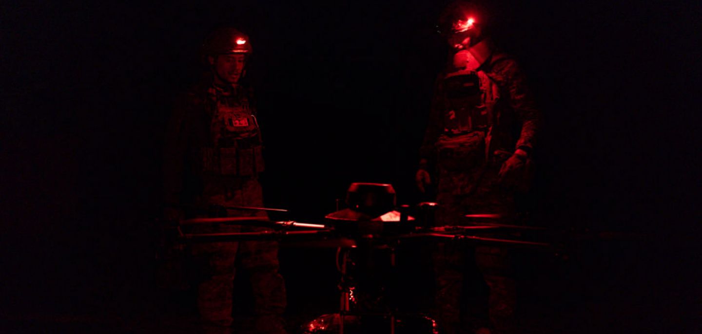 Service members of Ukraine's 13th Khartia Brigade load a Vampire drone with food and ammunition supplies to be delivered to the infantry at the frontline on March 7, 2025, in the Kharkiv region of Ukraine. 