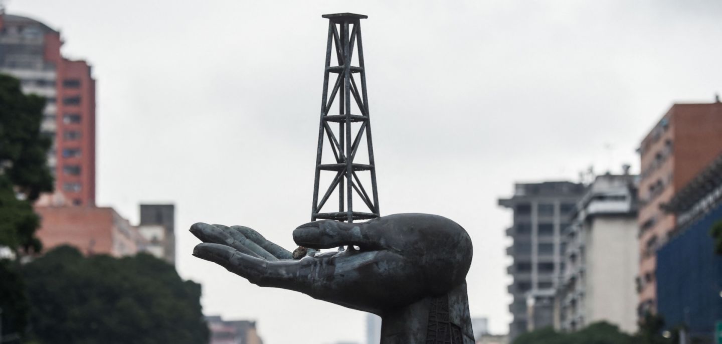 The Peace Monument sculpture is seen in front of the PDVSA headquarters in Caracas, Venezuela, on Dec. 2, 2022. 