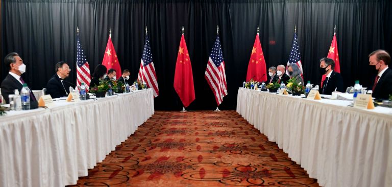 U.S. and Chinese officials face each other during talks in Anchorage, Alaska, on March 18, 2021. U.S. and Chinese officials face each other during talks in Anchorage, Alaska, on March 18, 2021.