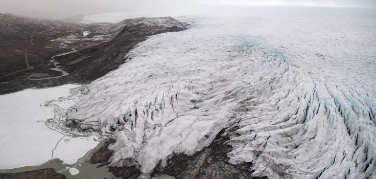 A photo taken during a helicopter tour with U.S. Secretary of State Antony Blinken shows ice receding from a glacier near Kangerlussuaq, Greenland, on May 20, 2021. A photo taken during a helicopter tour with U.S. Secretary of State Antony Blinken shows ice receding from a glacier near Kangerlussuaq, Greenland, on May 20, 2021.