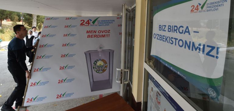 Members of a local election commission prepare a polling station in Tashkent, Uzbekistan, on Oct. 21, 2021, ahead of the country’s presidential election. Members of a local election commission prepare a polling station in Tashkent, Uzbekistan, on Oct. 21, 2021, ahead of the country’s presidential election.
