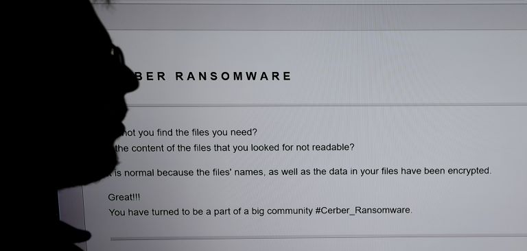 An IT researcher stands next to a giant screen of a computer infected by ransomware at High Security Laboratory of the National Institute for Research in Computer Science and Automation in Rennes, France, on Nov. 3, 2016. The evolution of hostage-taking and associated ransom demands suggests ransomware may grow to encompass more perpetrators, targets and demands. An IT researcher stands next to a giant screen of a computer infected by ransomware at High Security Laboratory of the National Institute for Research in Computer Science and Automation in Rennes, France, on Nov. 3, 2016.