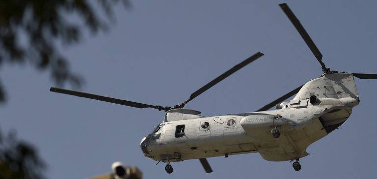 A U.S. military helicopter flies toward the Green Zone in Kabul, Afghanistan, on July 1, 2021. A U.S. military helicopter flies toward the Green Zone in Kabul, Afghanistan, on July 1, 2021.