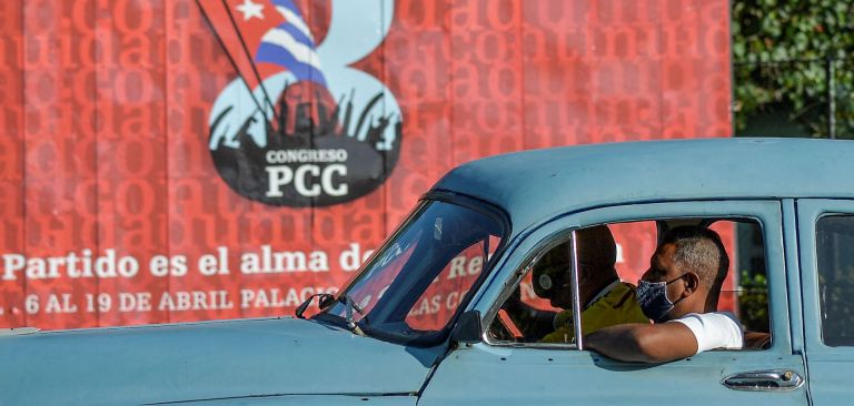 A motorist passes a sign for the 8th Congress of the Cuban Communist Party on April 6, 2021, in Havana. The Party will convene April 16-19 against the backdrop of broader Cuban discontent over a deteriorating economic situation, A motorist passes a sign for the 8th Congress of the Cuban Communist Party on April 6, 2021, in Havana.