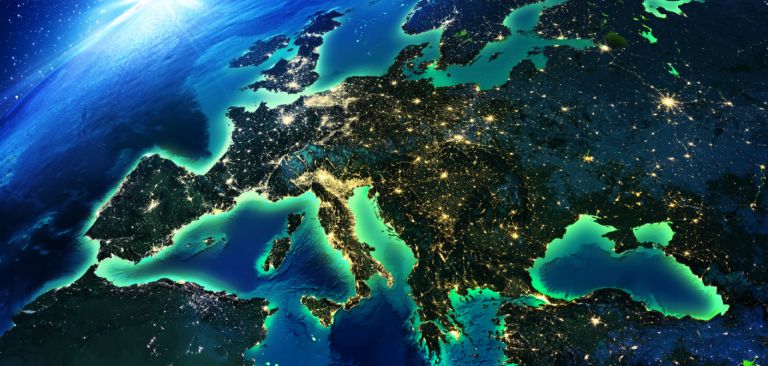 A satellite image shows Europe at night. A satellite image shows Europe at night.