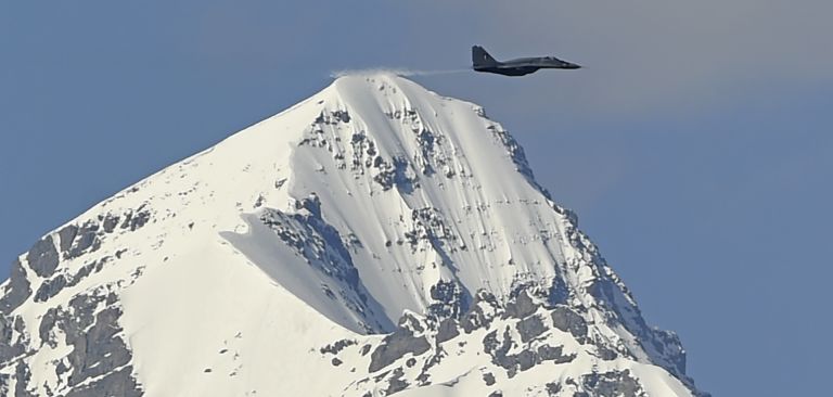 An Indian fighter jet flies over Ladakh, the disputed Himalayan region near the Chinese border, on June 26, 2020. An Indian fighter jet flies over Ladakh, the disputed Himalayan region near the Chinese border, on June 26, 2020.