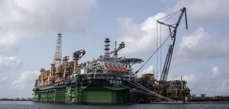 A photo shows the Egina FPSO (Floating Production Storage and Offloading) unit berthed at a harbor in Lagos, Nigeria. A photo shows the Egina FPSO (Floating Production Storage and Offloading) unit berthed at a harbor in Lagos, Nigeria.Â