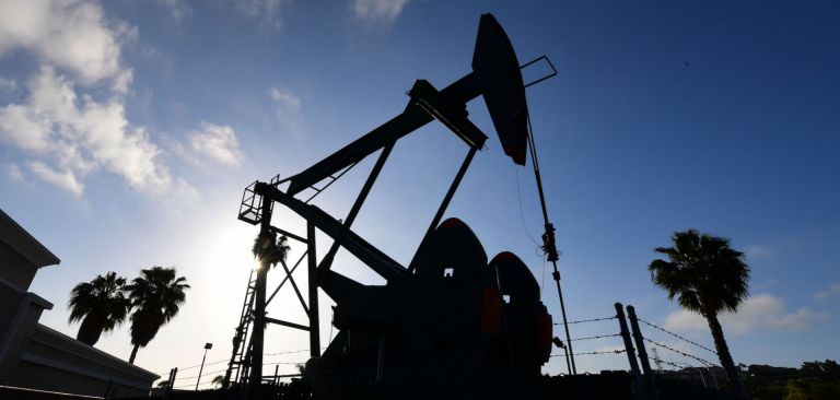 An oil pumpjack operates in Signal Hill, California, on April 21, 2020, a day after oil prices dropped to below zero amid the ongoing COVID-19 pandemic. An oil pumpjack operates in Signal Hill, California, on April 21, 2020, a day after oil prices dropped to below zero amid the ongoing COVID-19 pandemic.