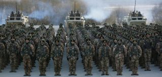 A photo taken on Jan. 4, 2021, shows Chinese soldiers assembling during military training in China's Xinjiang region. 
