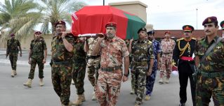 Omani army officers carry Sultan Qaboos bin Said al Said during a funeral procession Jan. 11 in Muscat.