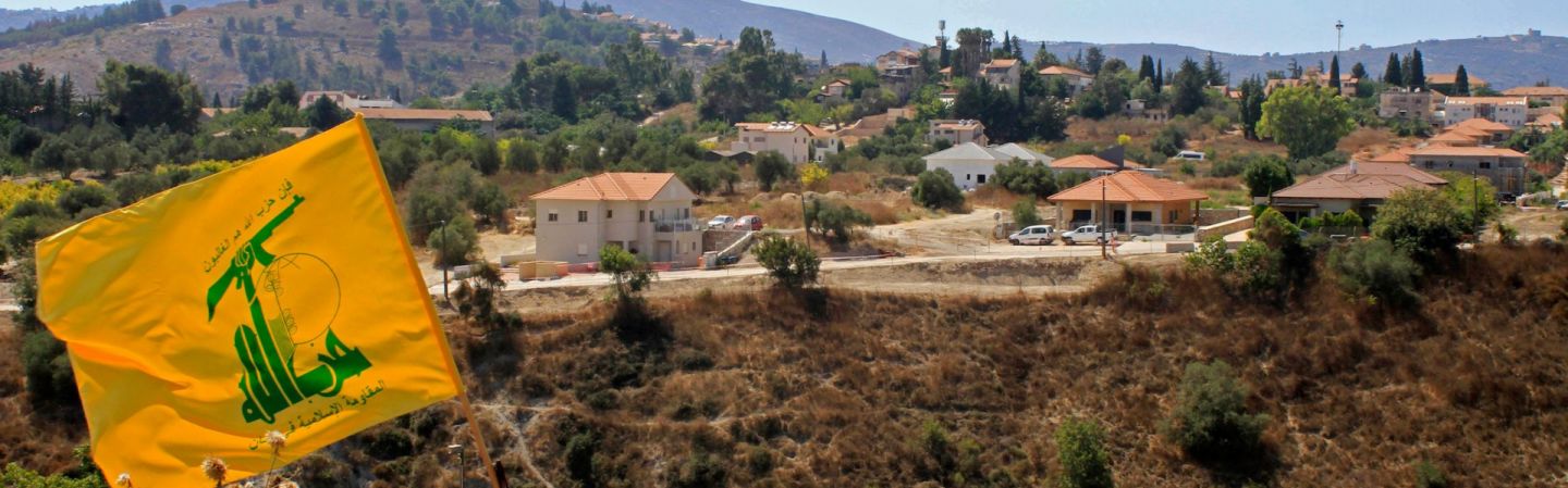 A Hezbollah flag flies on the Lebanese side of the border with Israel on September 2, 2019. 