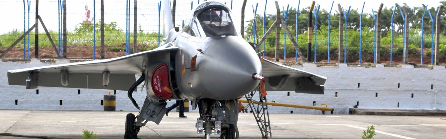 A ceremony, complete with a Hindu priest, marks the commissioning of a new Indian fighter jet in Bangalore.  
