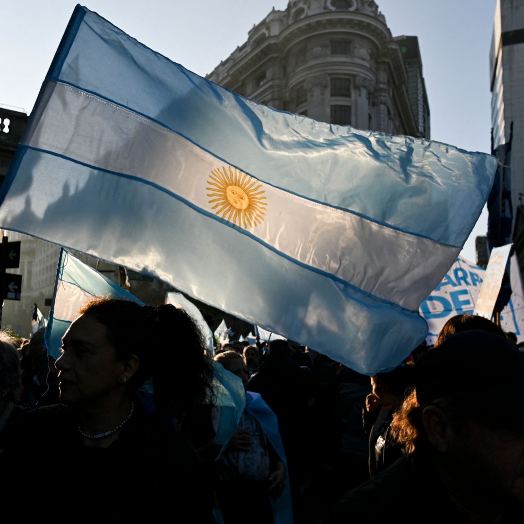 Protesters wave an Argentine flag at an anti-government rally in Buenos Aires on July 9, 2022. 